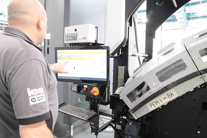 IES Print Engineer operating Computer Controls